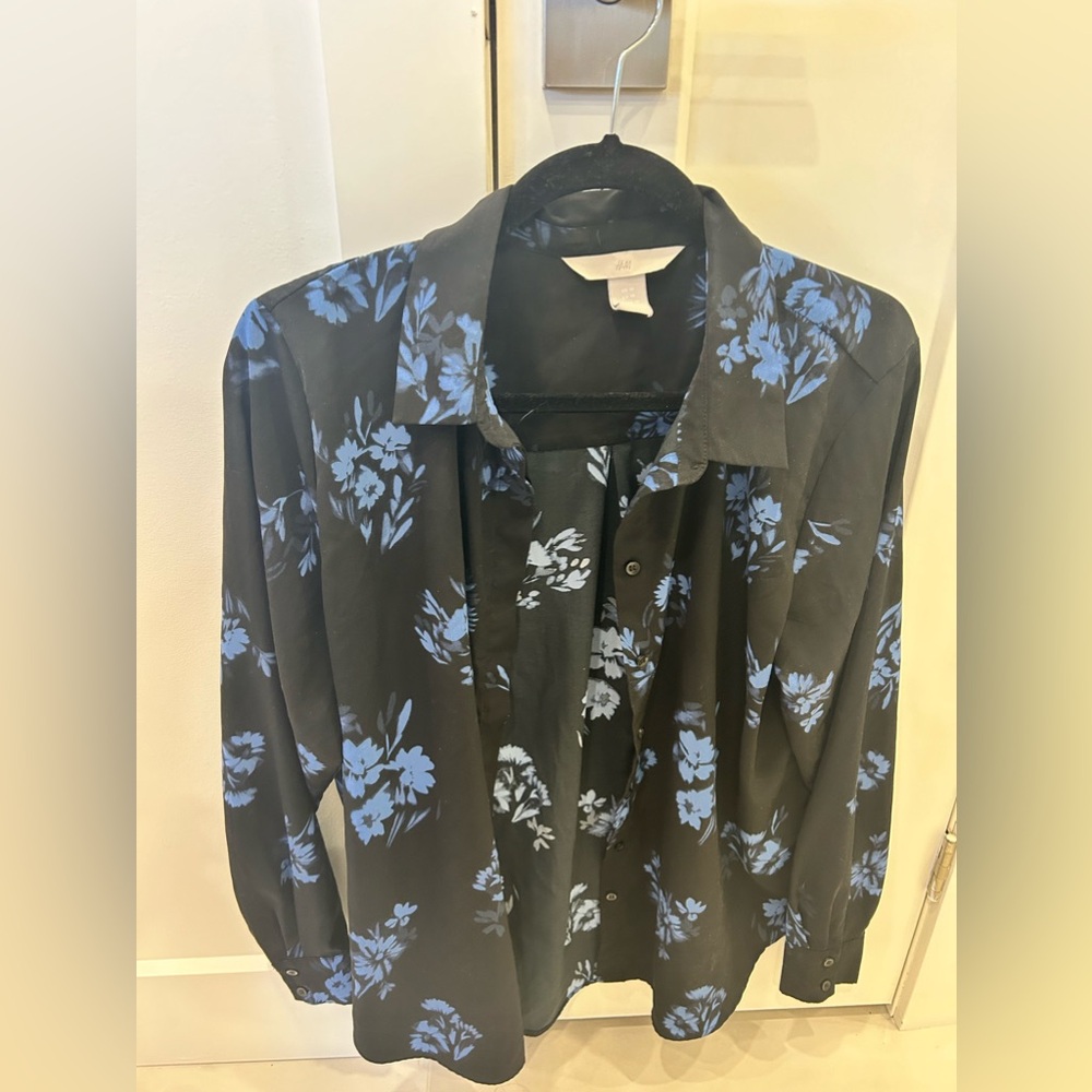 Lack and blue button down floral blouse.